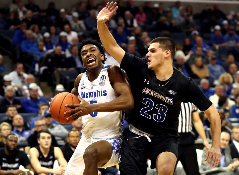 <strong>University of Memphis guard Kareem Brewton Jr. (5) charges toward the basket against South Dakota State guard Owen King (23) during a game against the Jackrabbits on Dec. 4, 2018.</strong> (Houston Cofield/Daily Memphian)