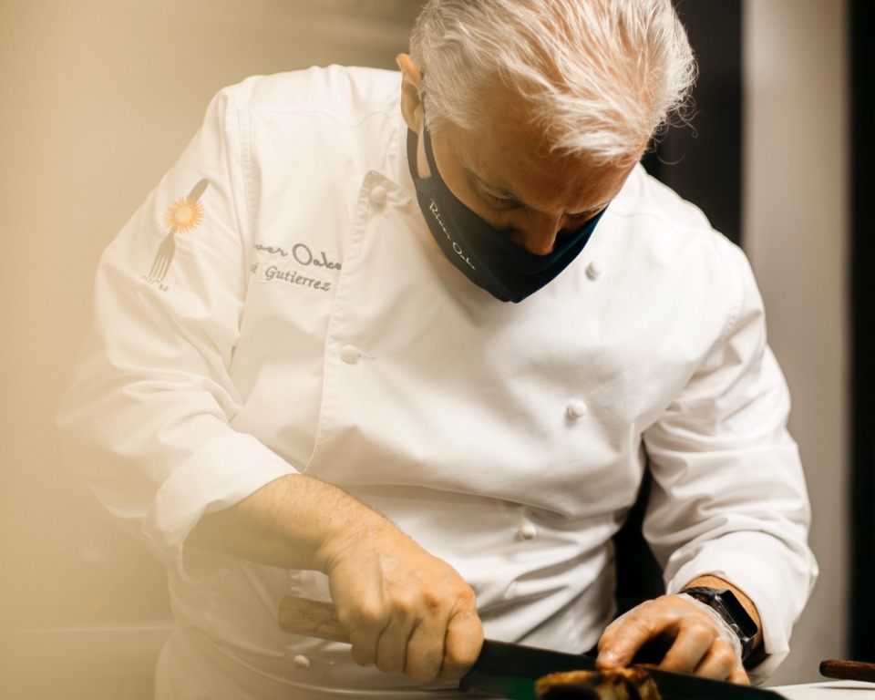 <strong>Jos&eacute; Gutierrez, master chef and owner of River Oaks restaurant, puts the finishing touches on a crispy tuna dish before it leaves the kitchen. </strong>(Houston Cofield/Special to The Daily Memphian)