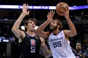 <span><strong>Memphis Grizzlies center Joakim Noah (55) drives against Los Angeles Clippers center Boban Marjanovic (51) in the second half of an NBA basketball game Wednesday, Dec. 5, 2018, in Memphis, Tenn.</strong> (AP Photo/Brandon Dill)</span>