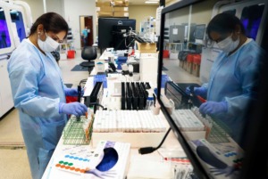 <strong>A Poplar Healthcare technician tested COVID-19 samples on Monday, July 6, 2020.</strong> (Mark Weber/Daily Memphian)