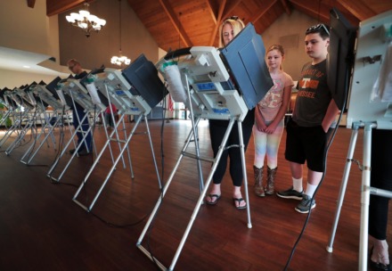<strong>Candice Hamilton and her children&nbsp; at the Riveroaks Reformed Presbyterian Church polling location in Germantown on March 3, 2020.</strong> (Daily Memphian file)