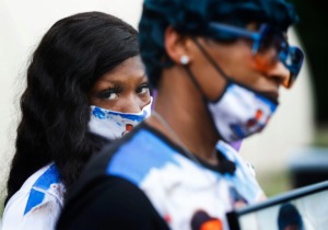 <strong>Henenissia Stewart, Darrius Stewart&rsquo;s sister, listens to her mother speak to a crowd gathered to remember Darrius Stewart on Friday, July 17, 2020. Darrius Stewart was shot and killed five years ago by Memphis Police Officer Connor Schilling.</strong> (Mark Weber/Daily Memphian)