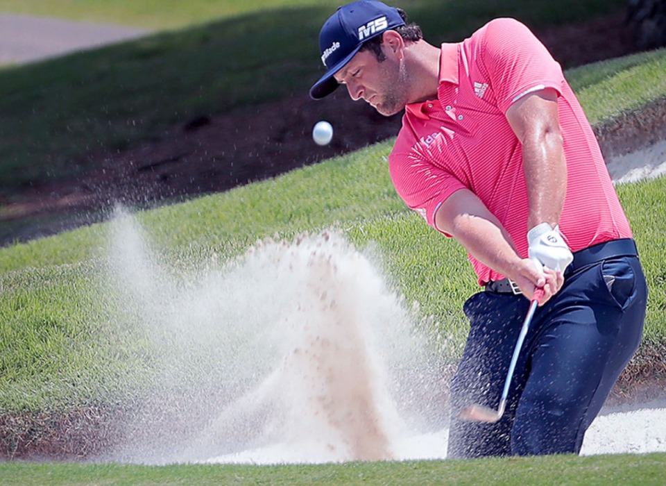 <strong>Jon Rahm punches a ball out of a sand trap at the World Golf Championship&rsquo;s final round in Memphis on July 28, 2019.</strong> (Patrick Lantrip/Daily Memphian file)