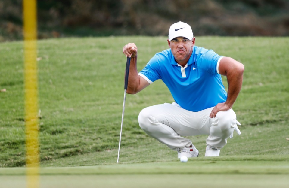 <strong>Brooks Koepka eyes his putt on hole 2 green during final round action at the WGC-FedEx St. Jude Invitational at TPC Southwind, Sunday, July 28, 2019.</strong>&nbsp;<strong>Suffering from a knee injury, Koepka hasn&rsquo;t won on tour all year.</strong> (Mark Weber/Daily Memphian).