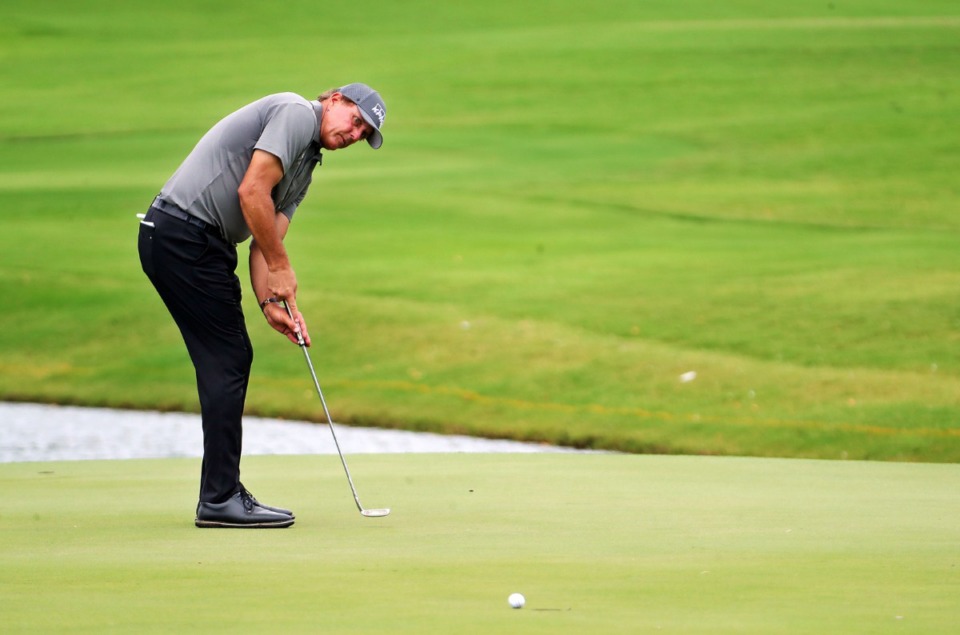 <strong>Phil Mickelson puts on the ninth green during the first day of the WGC-FedEx St. Jude Invitational at TPC Southwind in Memphis Thursday July 30, 2020.</strong> (Patrick Lantrip/Daily Memphian)