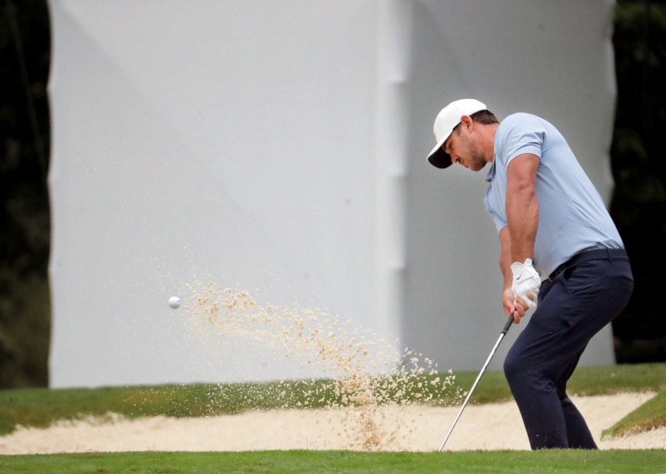 <strong>Brooks Koepka punches the ball out of a bunker during the third round of the WGC-FedEx St. Jude Invitational in Memphis, Tennessee, Aug. 1, 2020.</strong> (Patrick Lantrip/Daily Memphian)