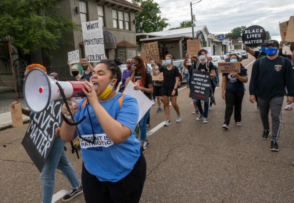 <strong>Co-organizer of the Solidarity March, Allyson Smith, leads a group of protesters down Madison Ave near Cooper Saturday, August 1, 2020.</strong> (Greg Campbell/Special to The Daily Memphian)