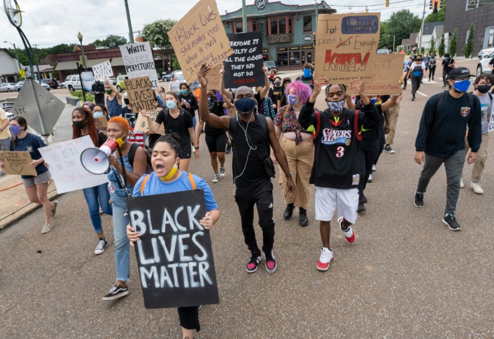 <strong>Co-organizer of the Solidarity March, Allyson Smith, leads a group of protesters down Cooper Street Saturday, August 1, 2020.</strong> (Greg Campbell/Special for to Daily Memphian)