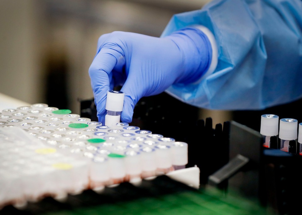 <strong>Poplar Healthcare technician Lakshmi Nellore logs tested COVID-19 samples on Monday, July 6, 2020.</strong> (Mark Weber/Daily Memphian)