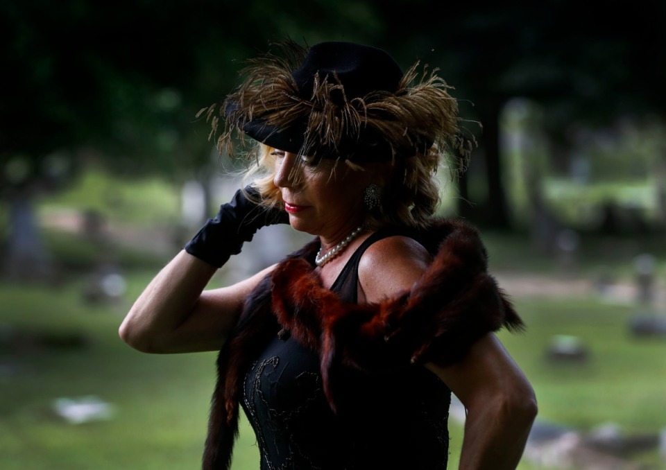 <strong>Actress Susan &ldquo;Cookie&rdquo; Swain portrays Geneva Barnes Ramsey Williams, who was the first wife of notorious gangster Machine Gun Kelly, during filming of Elmwood Cemetery&rsquo;s annual fall "Soul of the City" tour on Friday, July 31, 2020. The cemetery&rsquo;s annual fundraiser can be experienced virtually this year due to the pandemic.</strong> (Mark Weber/Daily Memphian)