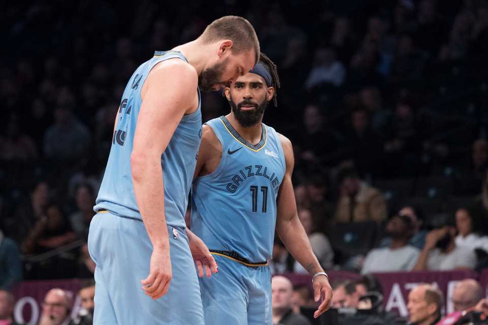 <span><strong>Memphis Grizzlies guard Mike Conley (11) and center Marc Gasol react the second half of an NBA basketball game against the Brooklyn Nets, Friday, Nov. 30, 2018, in New York. The Grizzlies won 131-125.</strong> (AP Photo/Mary Altaffer)</span>
