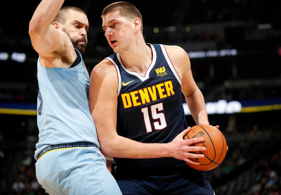 <span><strong>Denver Nuggets center Nikola Jokic, right, goes up for a basket as Memphis Grizzlies center Marc Gasol defends in the second half of an NBA basketball game Monday, Dec. 10, 2018, in Denver. The Nuggets won 105-99.</strong> (AP Photo/David Zalubowski)</span>