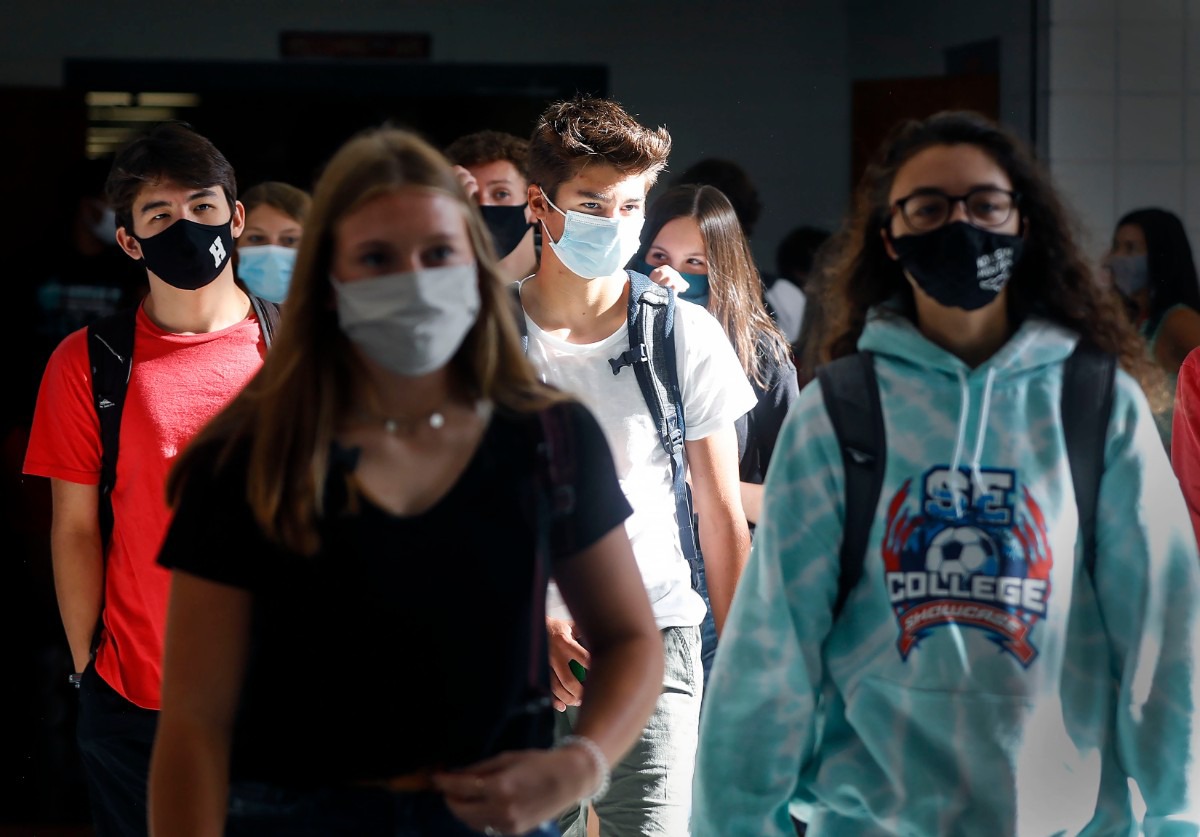 <strong>Houston High School students walk to their second period classes on the first day of school Monday, August 17, 2020. There are nearly 2,000 students who attend the high school, but due to COVID-19 guidelines, there will be only be about 700 in the building on any given day. On Fridays all students will take part in virtual learning</strong>. (Mark Weber/Daily Memphian)