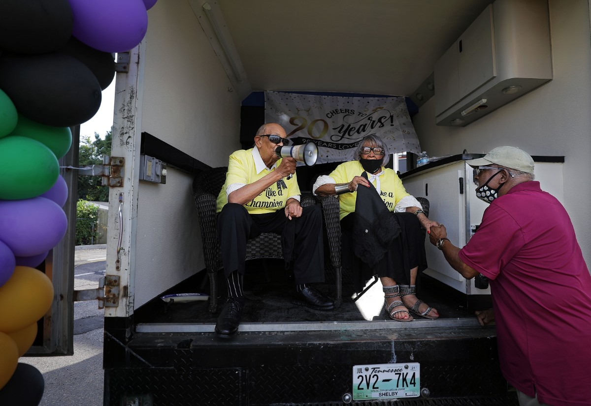 <strong>Marvin Newsum greets Carolyn Champion while wishing her husband, Charles, a happy 90th birthday Saturday, Aug. 22.</strong> (Patrick Lantrip/Daily Memphian)