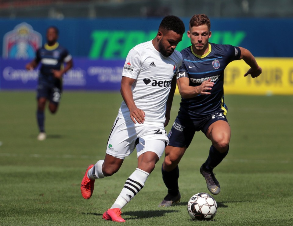 <strong>Earlier this momth Memphis 901 FC midfielder Rafael Mentzingen (14) fended off North Carolina FC defender D.J. Taylor (27) during a home match at AutoZone Park, Aug. 8, 2020.</strong> (Patrick Lantrip/Daily Memphian)