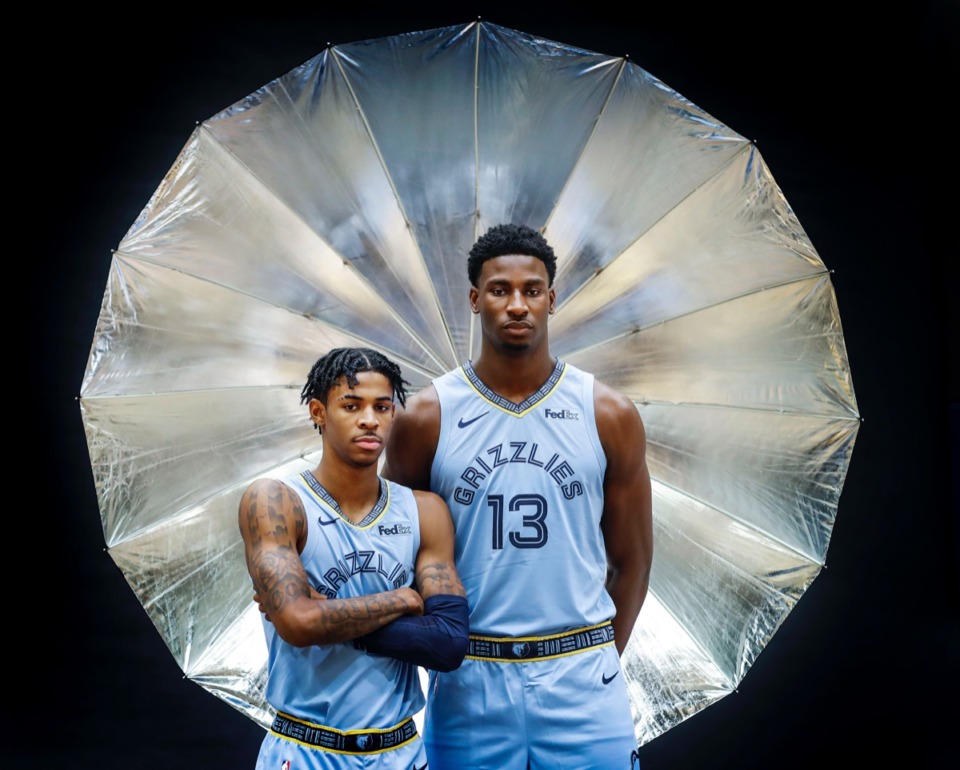 <strong>Teammates from Ja Morant (left) and Jaren Jackson Jr. (right) pose for pictures during the Memphis Grizzlies media day Monday, Sept. 30, 2019.</strong> (Mark Weber/Daily Memphian)