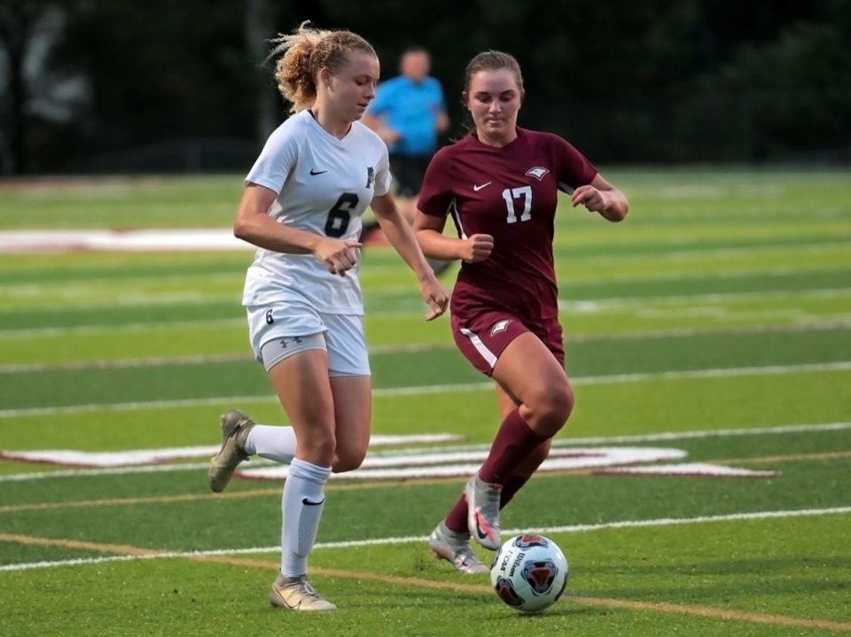 <strong>Arlington&rsquo;s Alindsey Long (6) battles against Annie Todd (17) of ECS on Aug. 25, 2020.</strong> (Patrick Lantrip/Daily Memphian)