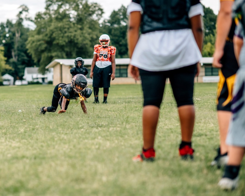<strong>Kadarius Pratcher (10) practices bear crawling at Godwin Park with his flag football team.&nbsp;</strong>(Houston Cofield/Special to&nbsp;The Daily Memphian)