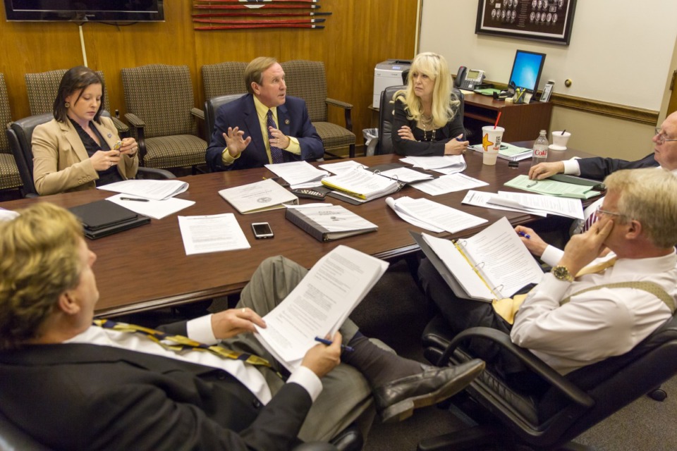<strong>State Rep. Bill Beck (D-Nashville), seen here at far right in 2015, has tested positive for COVID-19.</strong> (Erik Schelzig/AP file)