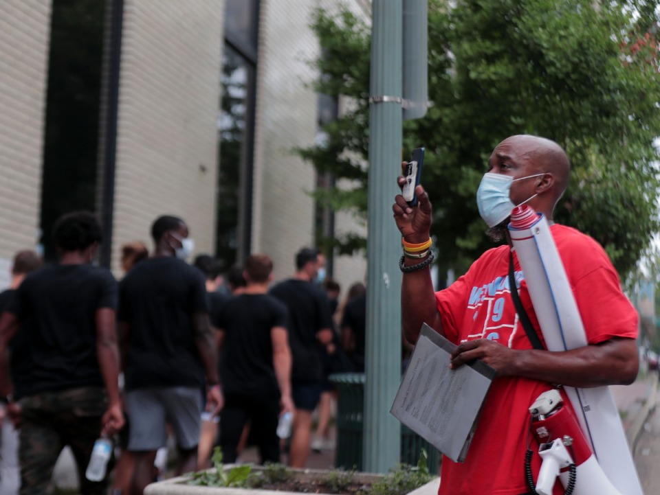 <strong>Joseph Cox thanks the Memphis 901 FC soccer team as they walk to the National Civil Rights Museum after choosing to not play their scheduled game to protest against racial injustice.</strong> (Patrick Lantrip/Daily Memphian)