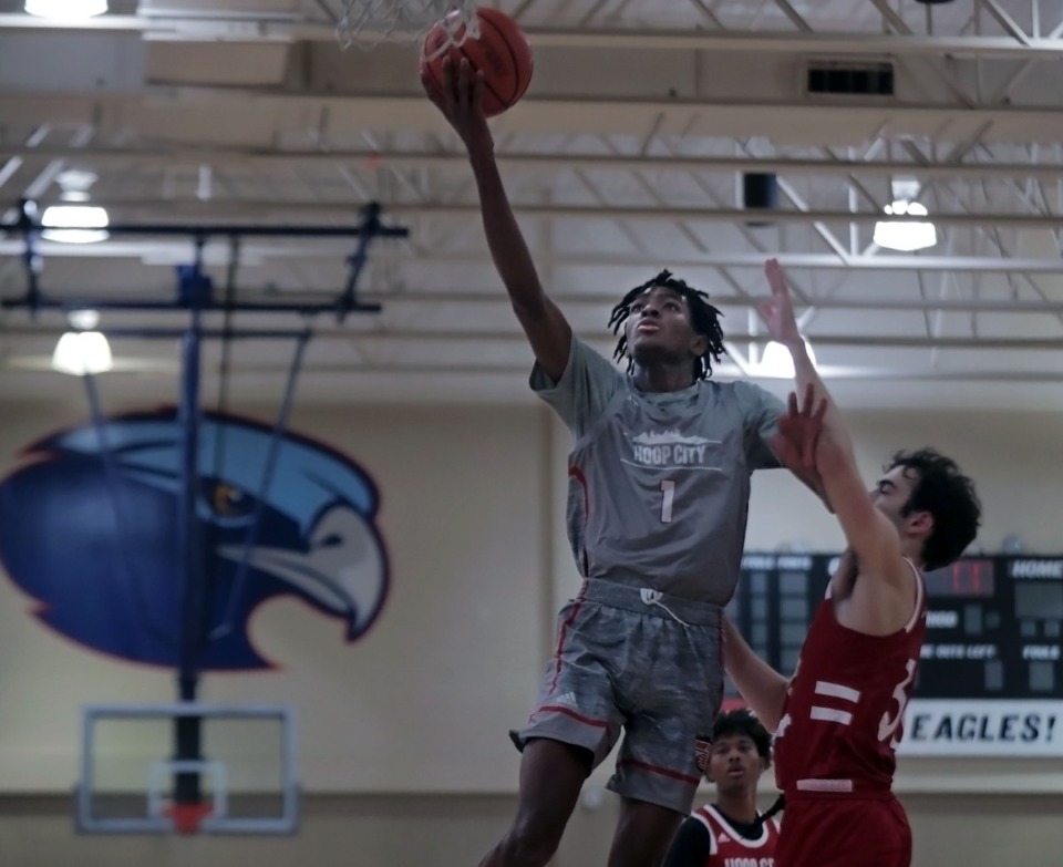 <strong>Hoop City guard Jonathan Lawson goes in for a layup during a showcase game at St. Benedict Aug. 29, 2020.</strong> (Patrick Lantrip/Daily Memphian)
