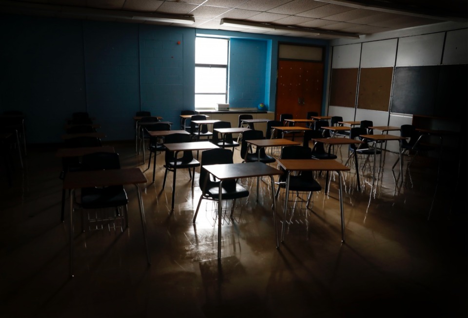 <strong>An empty classroom at KIPP Memphis Collegiate High remains dark as students attend the first day of virtual school due to the COVID-19 pandemic on Monday, August 31, 2020</strong>. (Mark Weber/Daily Memphian)