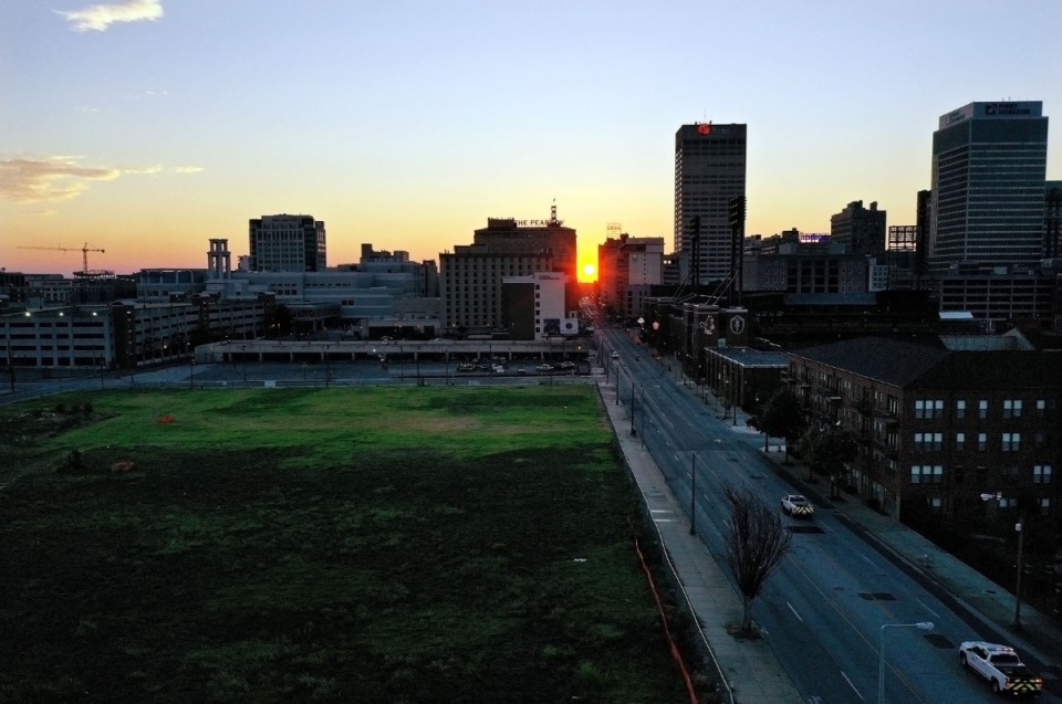 <strong>The sun sets over Union Avenue in Downtown Memphis Aug. 5, 2020, near where The Walk, a billion-dollar mixed-use project formerly known as Union Row will soon arise.</strong> (Patrick Lantrip/ Daily Memphian file)