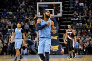 <span><strong>Memphis Grizzlies guard Mike Conley (11) gestures in the second half of an NBA basketball game against the Portland Trail Blazers on Wednesday, Dec. 12, 2018, in Memphis, Tenn.</strong> (AP Photo/Brandon Dill)</span>