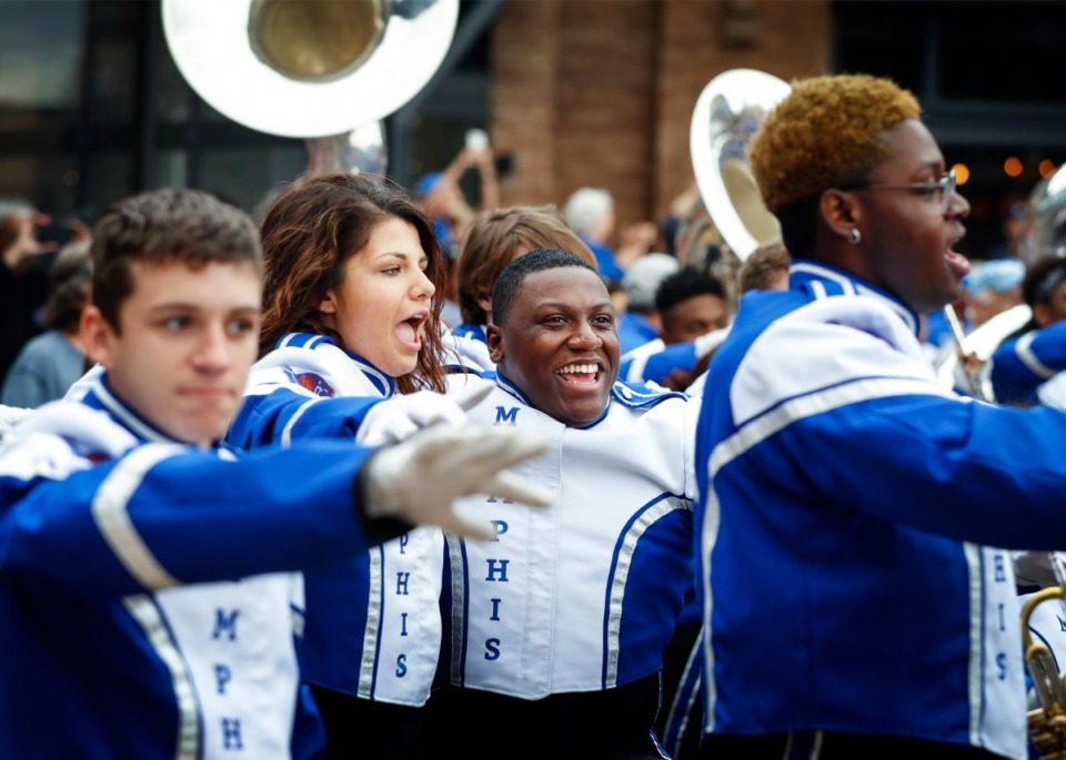 <strong>Prior to the pandemic, Mighty Sound of the South members celebrated while performing at the Cotton Bowl&rsquo;s Battle of Bands event in December 2019. Now, due to COVID-19 restrictions, only 44 of the band&rsquo;s 205 members will be able to play at Saturday&rsquo;s season opener against Arkansas State.</strong> (Mark Weber/Daily Memphian file)