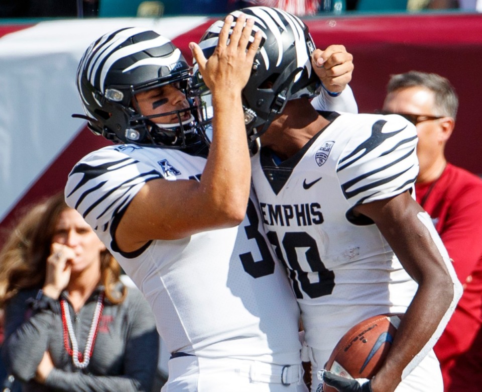 <strong>Memphis wide receiver Damonte Coxie (10) celebrates his touchdown with quarterback Brady White (3) during an NCAA college football game against Temple University Oct. 12, 2019, in Philadelphia.</strong> (Chris Szagola/AP file)