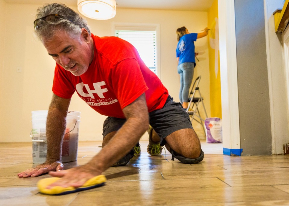 <strong>Volunteers of the Chris Hope Foundation (left to right,) Randolph Sanchez and Sarah Cross assisted in renovating North Memphis home for St. Jude family housing on July 25, 2020.</strong> (Ziggy Mack/Daily Memphian file)