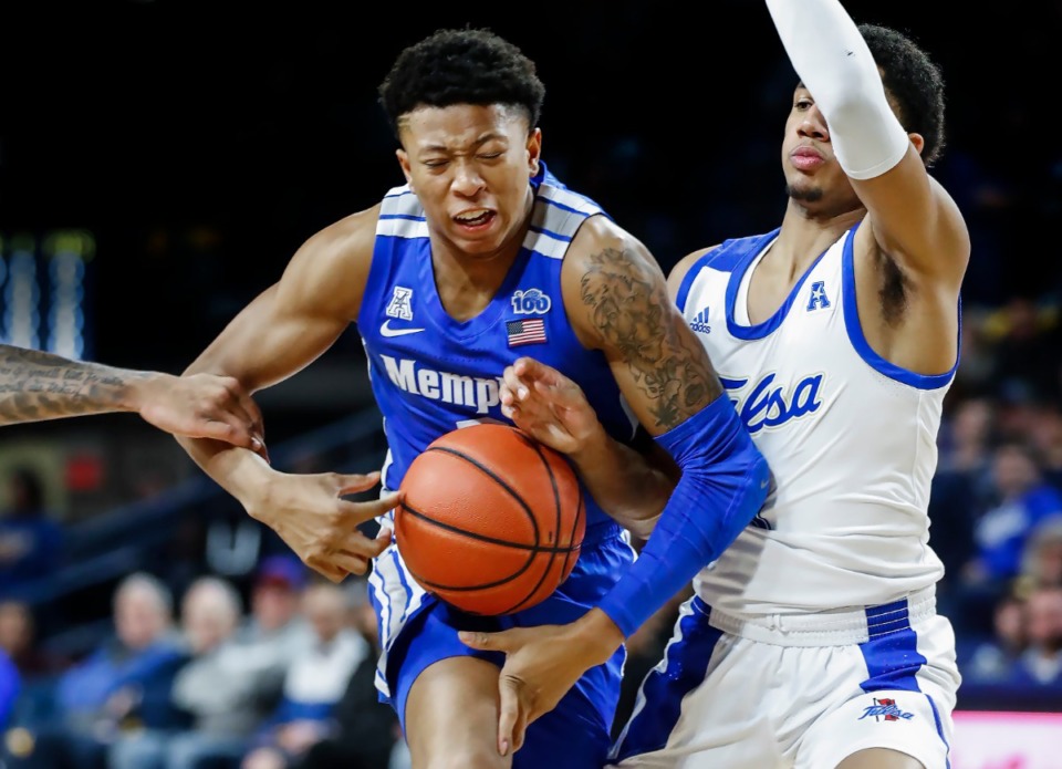 <strong>Memphis guard Boogie Ellis (left) drives the lane against Tulsa defender Isaiah Hill (right) during action Wednesday, Jan. 22, 2020 in Tulsa, Okla.&nbsp;&ldquo;Last year those freshman growing pains were difficult,&rdquo; said trainer Trent Suzuki.&nbsp;&ldquo;There were times he didn&rsquo;t always believe. This year it&rsquo;ll be totally different. He knows what he can do and what he has to do to help the team win.&rdquo;&nbsp; </strong>(Mark Weber/Daily Memphian file)