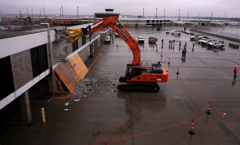 <strong>In this file photo, crew members from Flintco watch as one of their coworkers tears down a section of Memphis International Airport&rsquo;s Concourse B to make way for Memphis International Airport&rsquo;s modernization efforts Jan. 17, 2019.</strong> (Patrick Lantrip/Daily Memphian file)