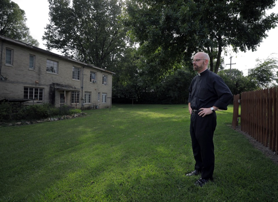 <strong>Father Ben Bradshaw stands outside of the old St. Michael Catholic Church parish office Sept. 17, 2020.</strong> (Patrick Lantrip/Daily Memphian)