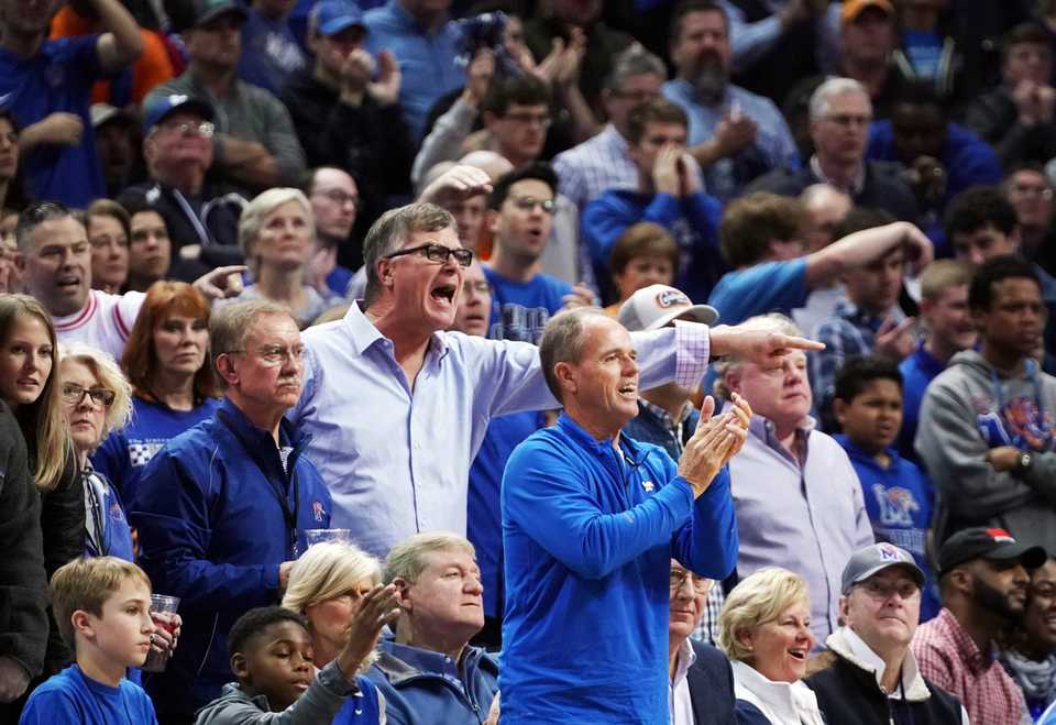 <strong>University of Memphis fans come to their feet during the Tigers' matchup against the University of Tennessee. A sellout crowd of more than 18,000 filled&nbsp;FedExForum in Memphis on Saturday, Dec. 16, 2018.</strong> (Karen Pulfer Focht/Special to The Daily Memphian)