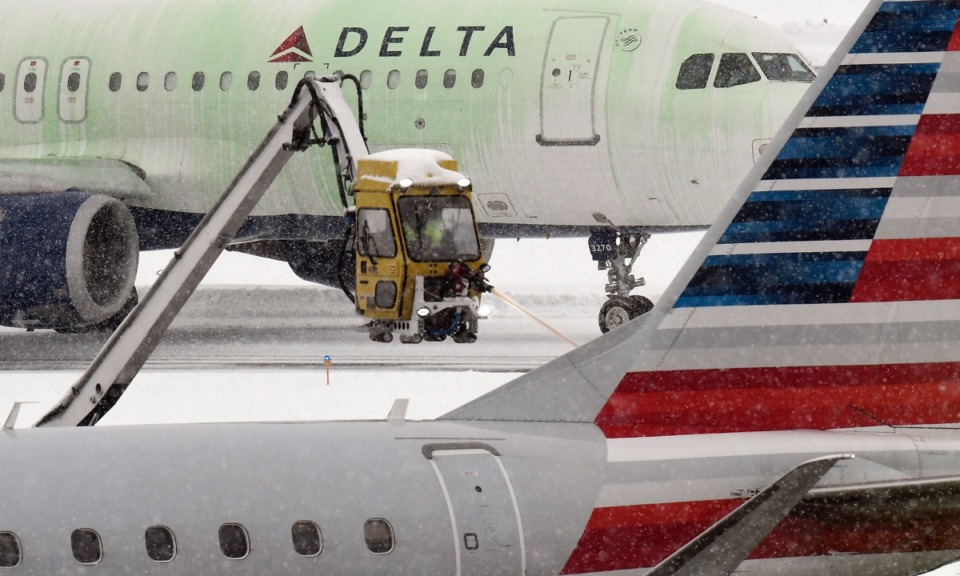 <strong>The FAA announced $31 million more for a planned facility to de-ice planes, like this procedure at the Albany International Airport in Colonie, N.Y., on Dec. 2, 2019.</strong> (Hans Pennink/AP)