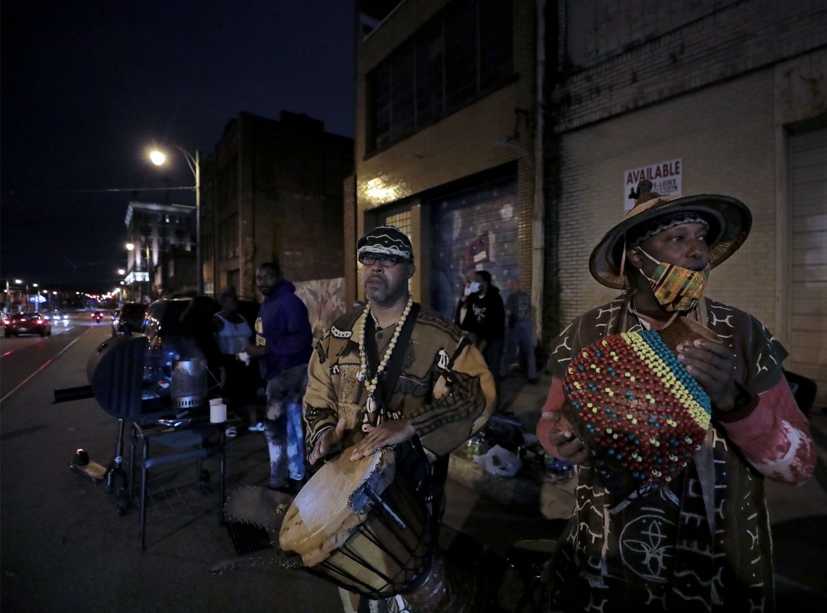 <strong>Protesters, including performers from the Memphis Black Arts Movement, hold a celebration of life gathering for Breonna Taylor on Sept. 24, 2020, outside of the home of a man who is accused of pointing a gun at them the previous night.</strong> (Patrick Lantrip/Daily Memphian)