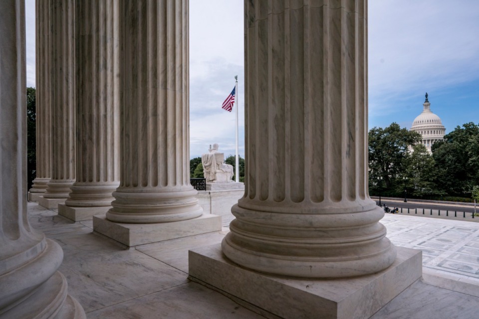 <strong>The columns of the Supreme Court are seen with the Capitol at right, in Washington. The Senate is ready to move quickly on President Donald Trump&rsquo;s nominee to replace the late Justice Ruth Bader Ginsburg.</strong> (J. Scott Applewhite/AP)