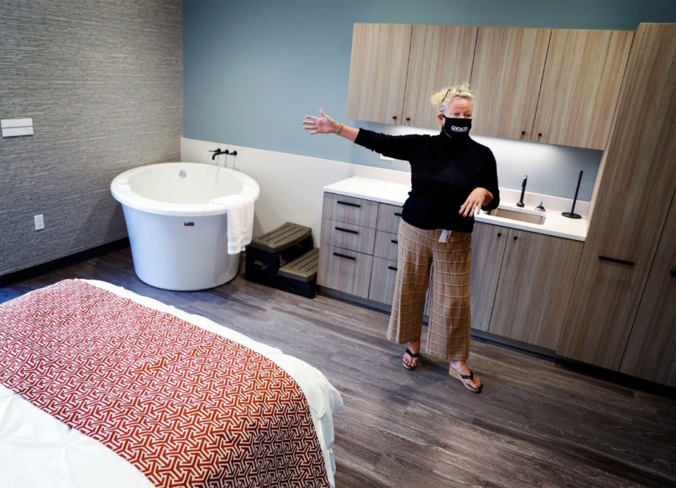 <strong>Katy Leopard, Director of External Affairs at CHOICES: Memphis Center for Reproductive Health shows a birthing suite while leading a tour of their new facility on Monday, Oct. 5, 2020, in Midtown.</strong> (Mark Weber/The Daily Memphian)