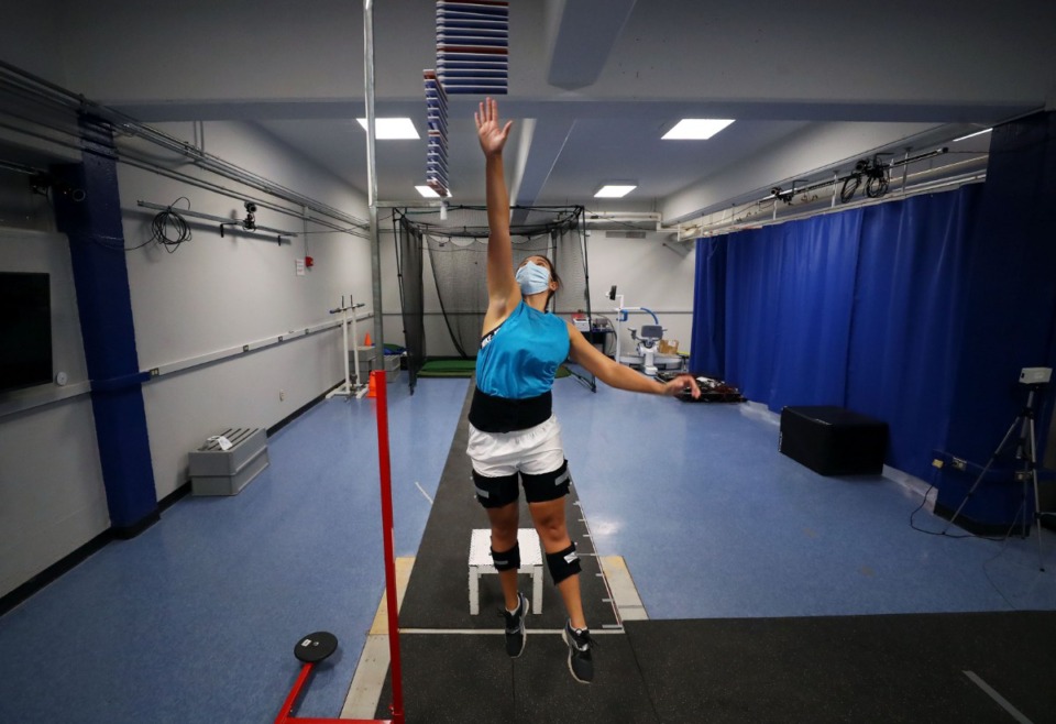 <strong>Daily Memphian reporter Danielle Lerner measures her maximum vertical at the University of Memphis Human Performance Center.</strong> (Patrick Lantrip/Daily Memphian)