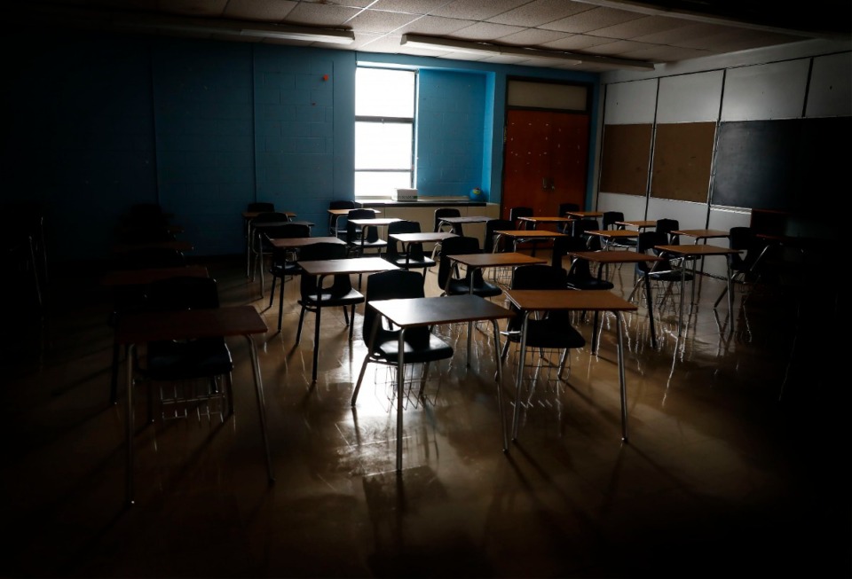 <strong>An empty classroom at KIPP Memphis Collegiate High remains dark as students attend the first day of virtual school from due the COVID-19 pandemic on Monday, Aug. 31, 2020.</strong> (Daily Memphian file)