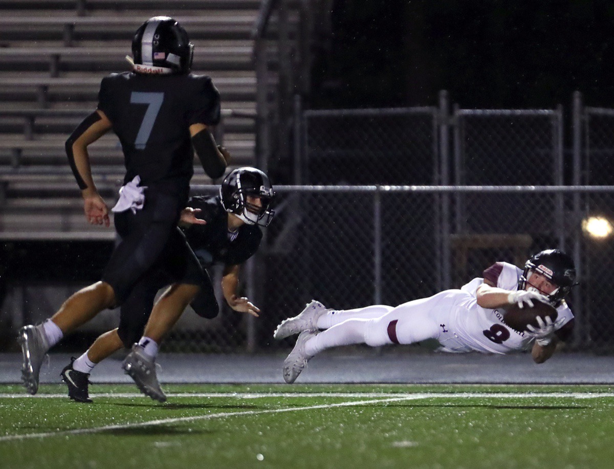 <strong>Collierville receiver Tyler Collier (8) makes a diving catch for a first down against Houston Oct. 9.</strong> (Patrick Lantrip/Daily Memphian)