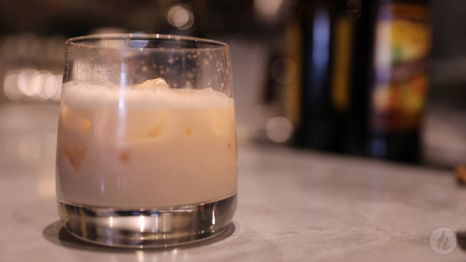 <strong>Milk punch, traditionally made with bourbon, is a classic holiday cocktail. Not a bourbon fan? Try it with dark rum instead.</strong>