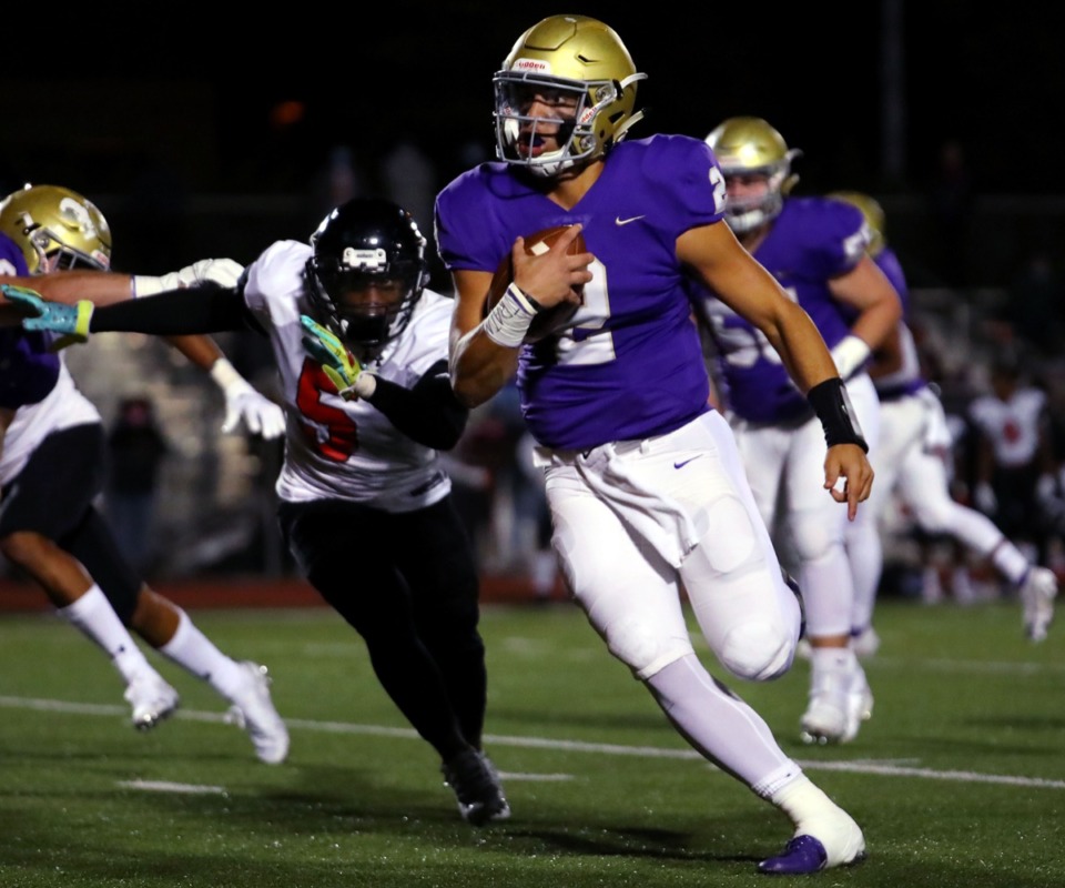 <strong>CBHS quarterback Ashton Strother (with ball) is pursued by PURE defenders on Oct. 16,.</strong> (Patrick Lantrip/Daily Memphian)