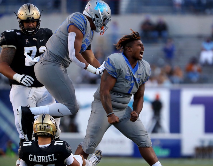 University of Memphis defensive lineman O'Bryan Goodson (1) celebrates after sacking University of Central Florida quarterback Dillon Gabriel (11) during an Oct. 17, 2020 game at Liberty Bowl Memorial Stadium. (Patrick Lantrip/Daily Memphian)