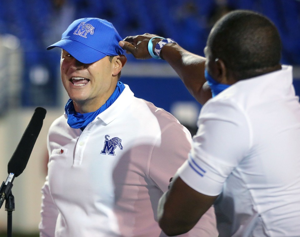 <strong>University of Memphis head coach Ryan Silverfield gets surprised by another coach during an ESPN interview after an Oct.17, 2020 game against University of Central Florida at Liberty Bowl Memorial Stadium.</strong> (Patrick Lantrip/Daily Memphian)