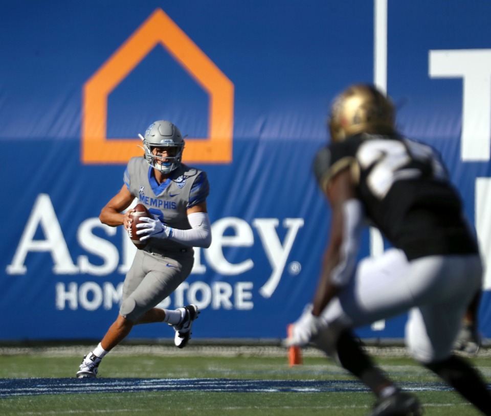 <strong>University of Memphis quarterback Brady White (3) during an rolls out of the pocket during an Oct. 17, 2020 game against University of Central Florida at Liberty Bowl Memorial Stadium.</strong> (Patrick Lantrip/Daily Memphian)