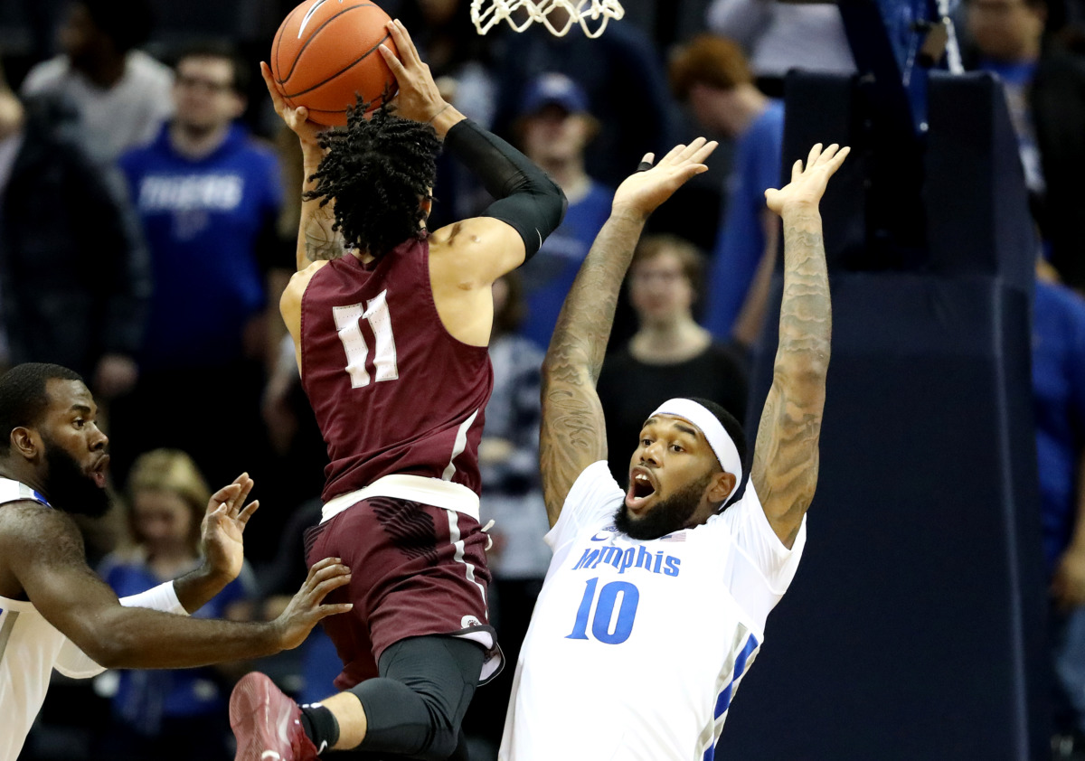 <strong>University of Memphis forward Mike Parks Jr. (10) attempts to block a shot by Little Rock Trojans guard Jaizec Lottie (11) as he drives towards the basket during&nbsp;<span class="s1">the Tigers game against the Little Rock Trojans on Wednesday, Dec. 19, 2018, at FedExForum in Memphis.&nbsp;</span></strong>(Houston Cofield/Daily Memphian)