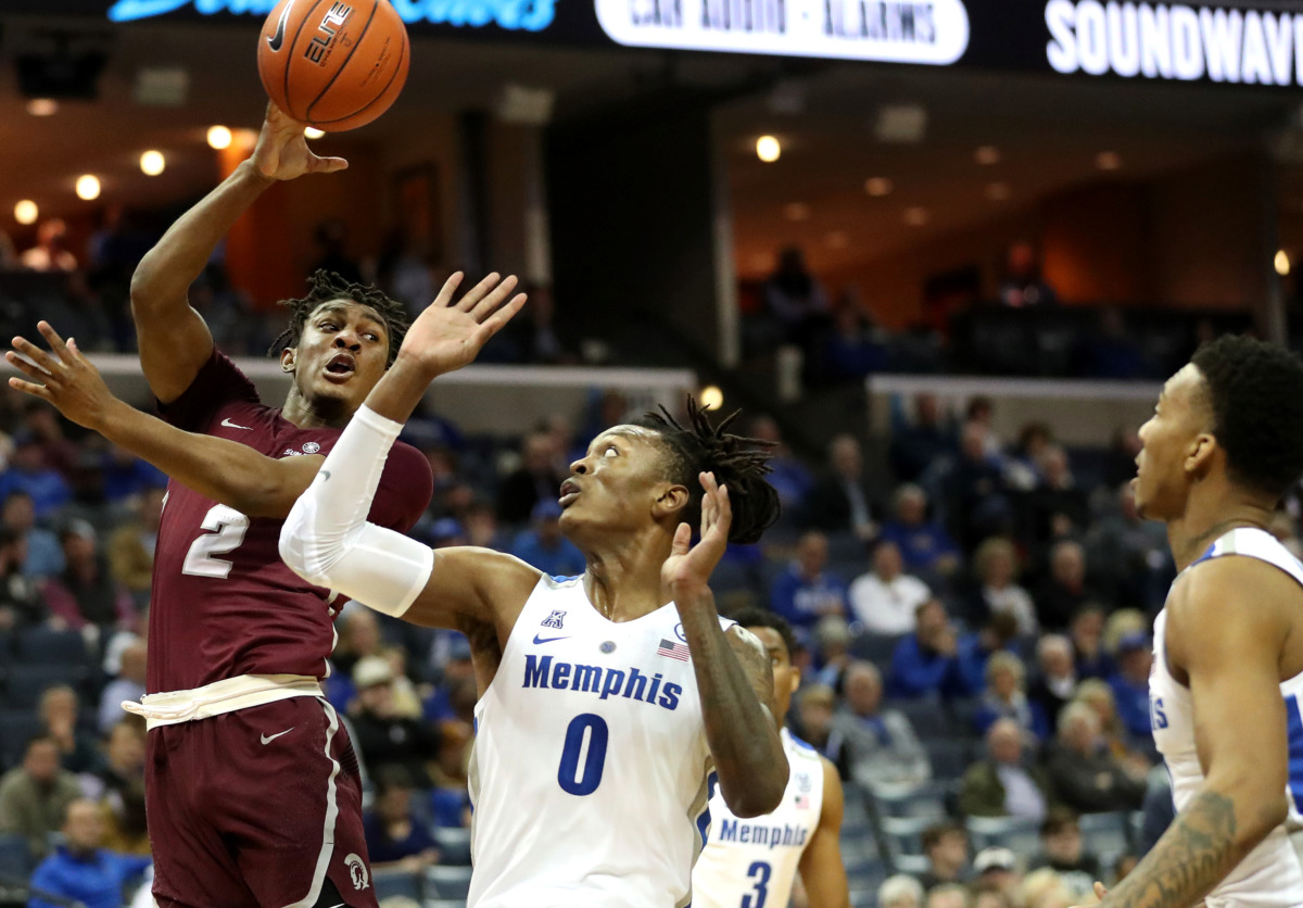 <strong>University of Memphis forward Kyvon Davenport (0) attempts to block a pass by Little Rock Trojans guard Deondre Burns (2) during a game&nbsp;on Wednesday, Dec. 19, 2018, at FedExForum in Memphis.</strong> (Houston Cofield/Daily Memphian)