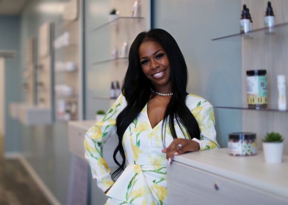 <strong>Chandra Watson poses for a portrait inside the Your CBD Store location in Millington Oct. 12, 2020. In addition to owning the Your CBD Store Millington location, the entrepreneur and mother of two also owns Wink Spalon in East Memphis.</strong> (Patrick Lantrip/Daily Memphian)